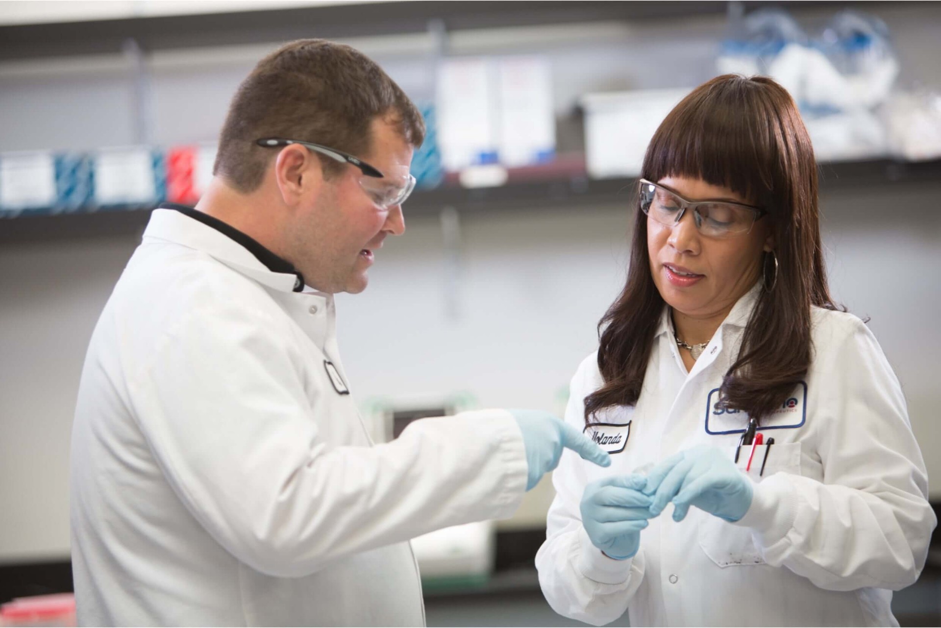 Two medical workers having a conversation