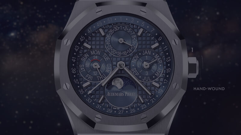 Man in front of drawings on a table