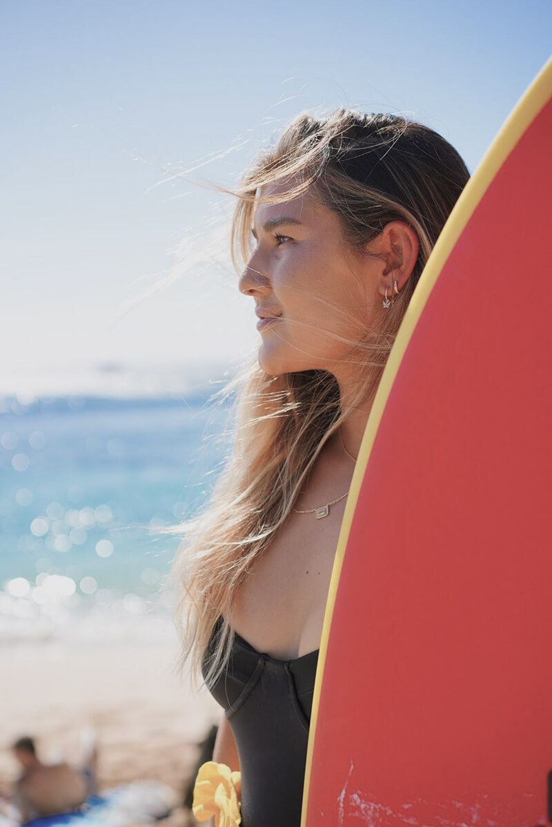 Woman with a surfing board