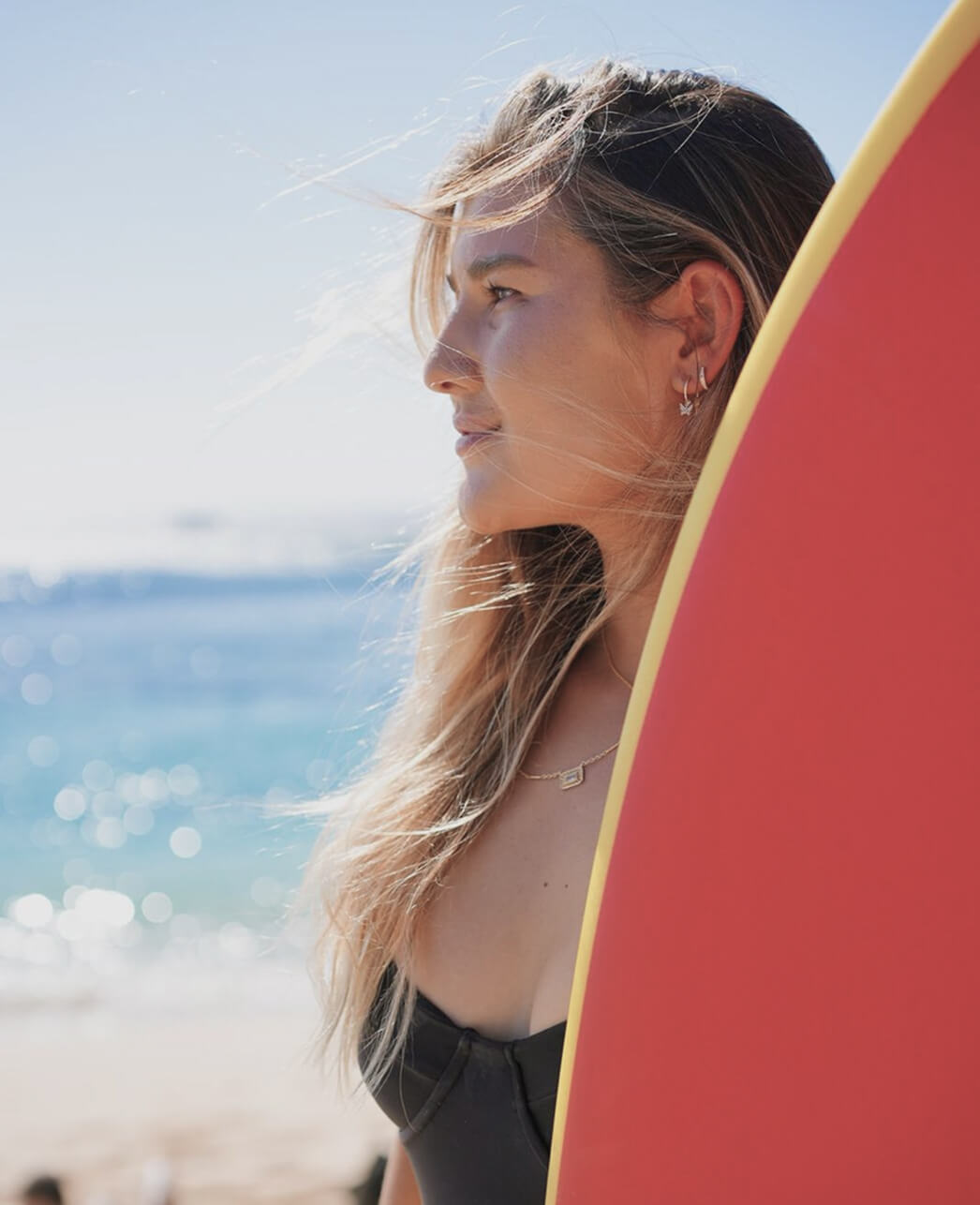 Woman with a surfing board